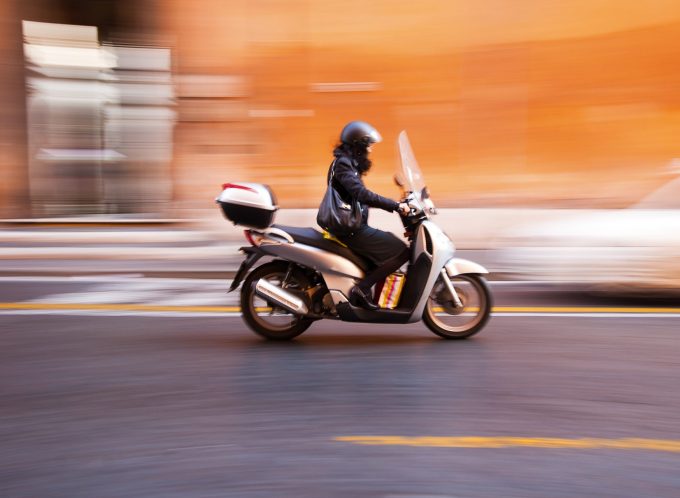 Woman on scooter motorcycle MVA claim