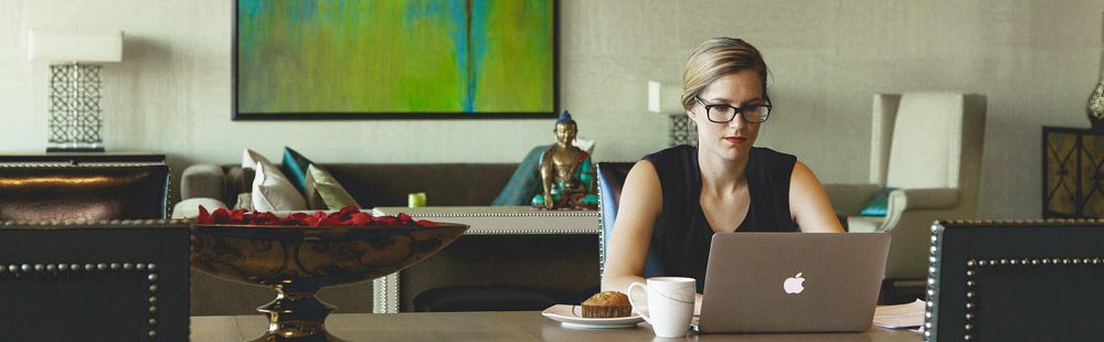 A woman uses her laptop to get started online