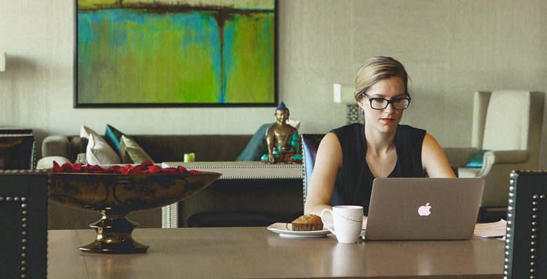 A woman uses her laptop to get started online